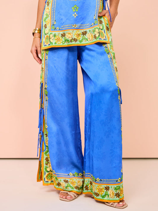 Pantalones de pierna ancha con cordones laterales y estampado de mosaicos