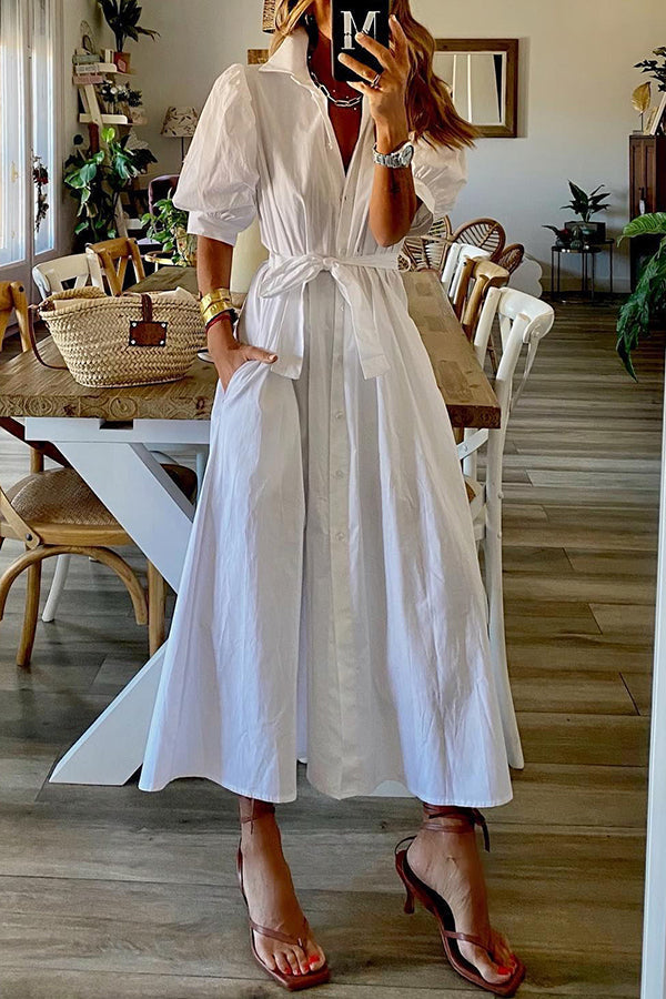 Vestido camisa midi vintage con botones, bolsillos y mangas abullonadas  