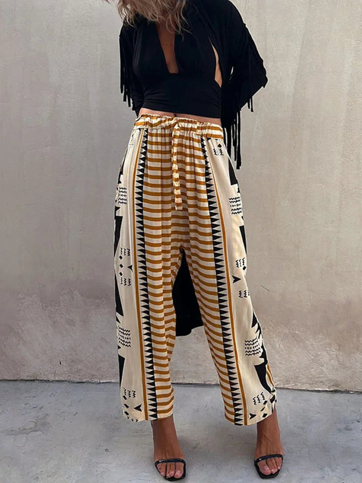 Pantalones harem boho con estampado geométrico, cintura elástica y cordón