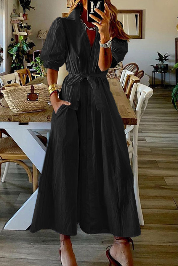 Vestido camisa midi vintage con botones, bolsillos y mangas abullonadas  